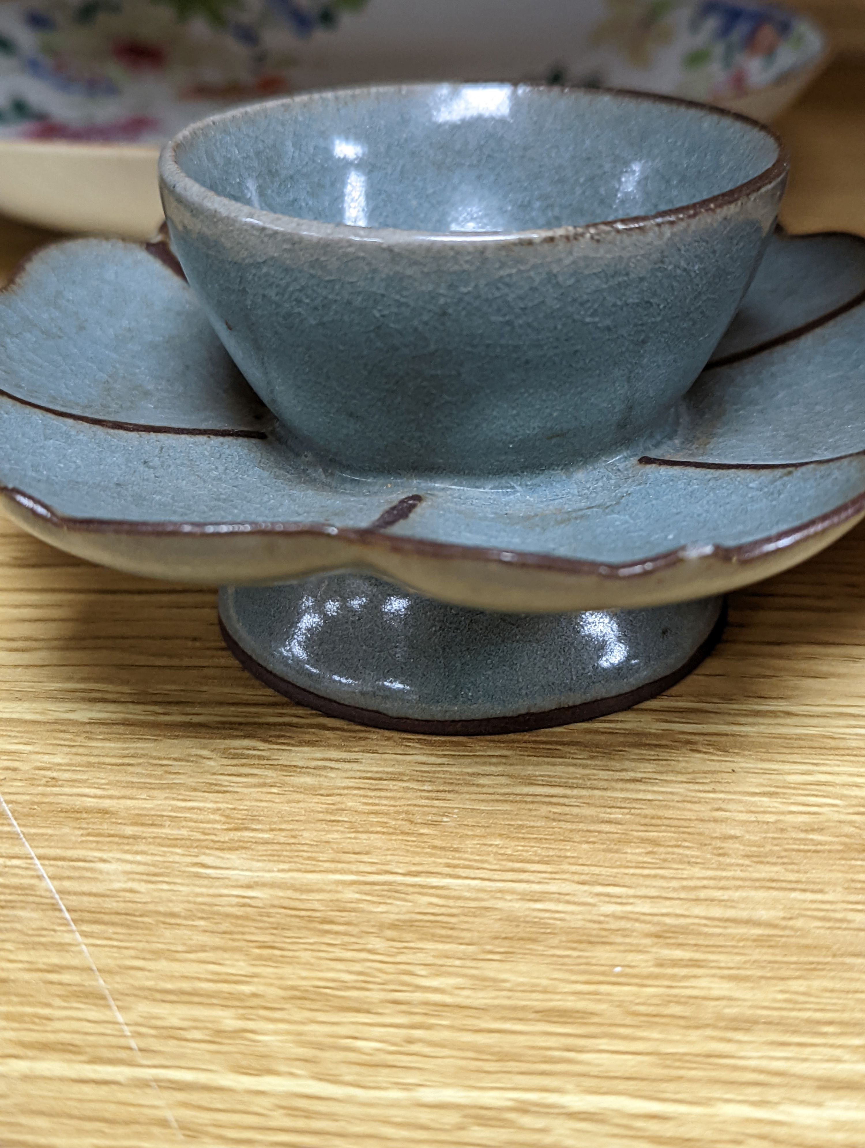 An 18th century Chinese famille rose dish, crackle-glaze stem cup, Beijing glass tea bowl and a Chinese Imari plate. Largest 24cm